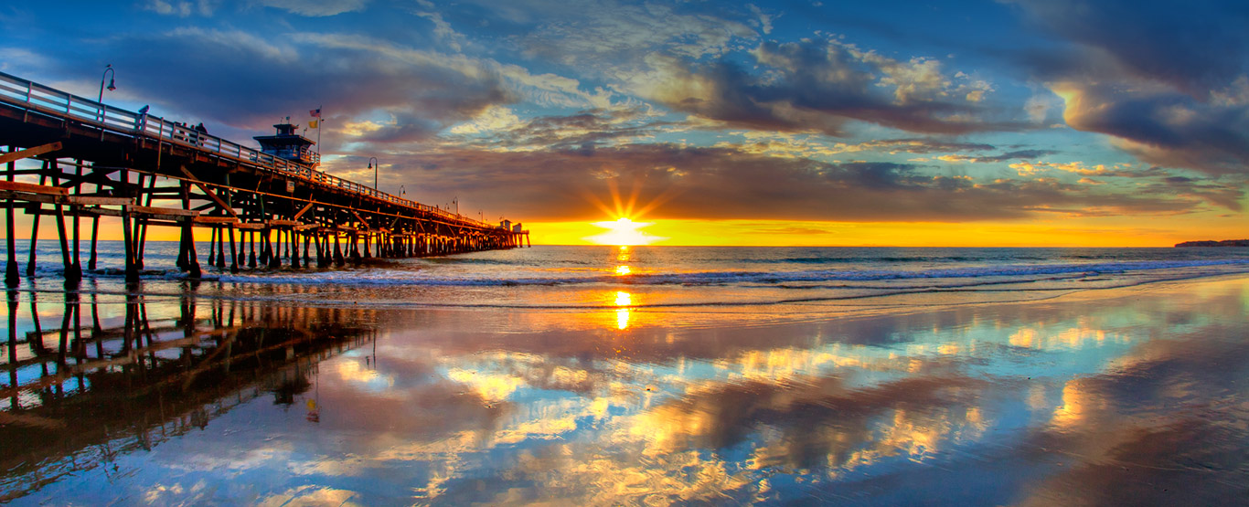 Ocean and pier during sunset
